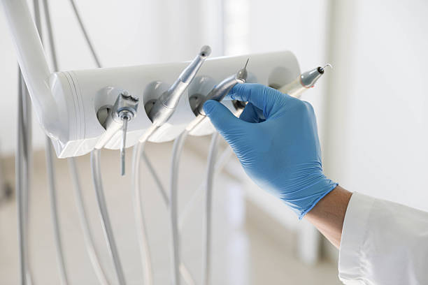 Professional Invisalign Clear Aligners technician working in Bedford, TX